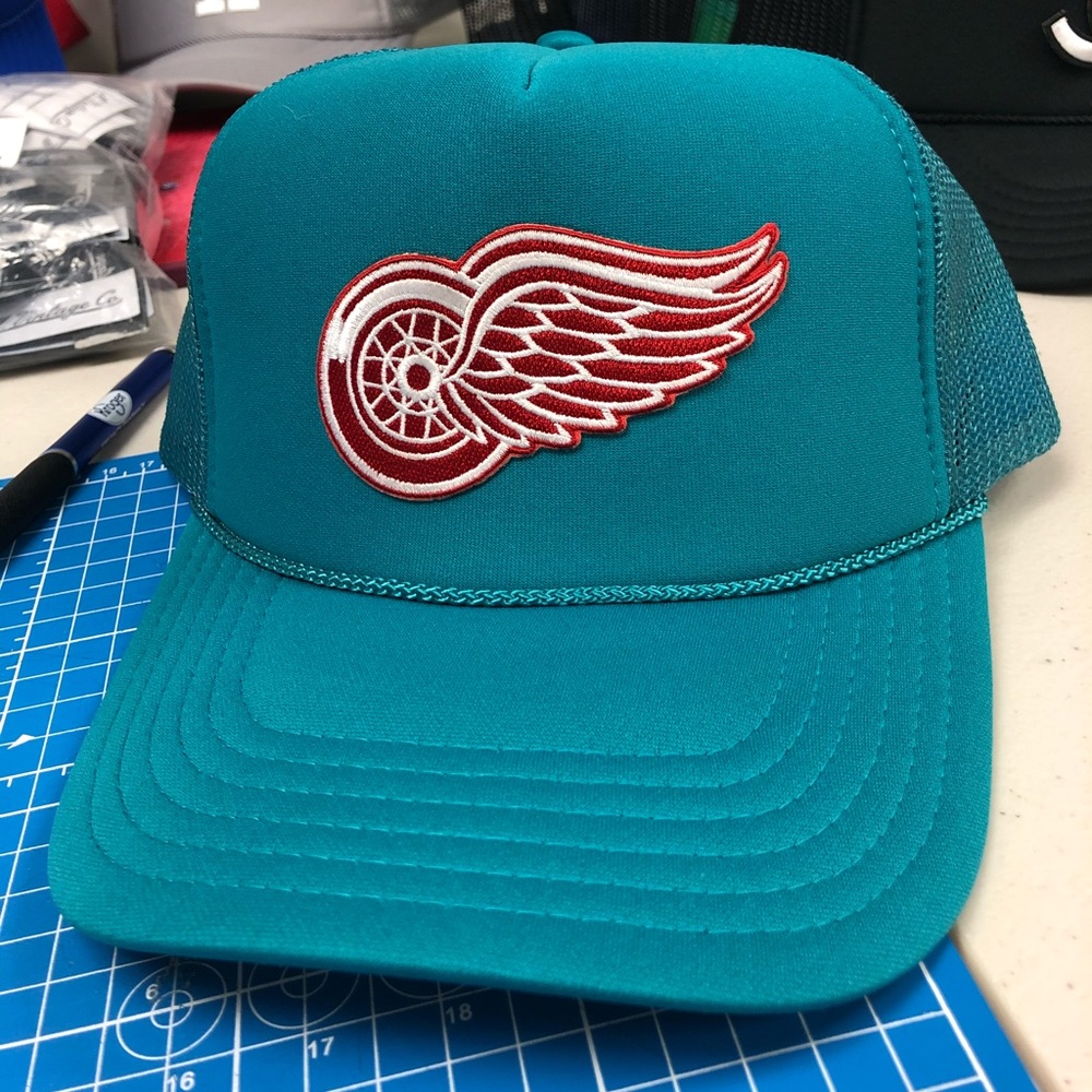 Custom made detroit red wings trucker hat. Vintage piston’s color way.